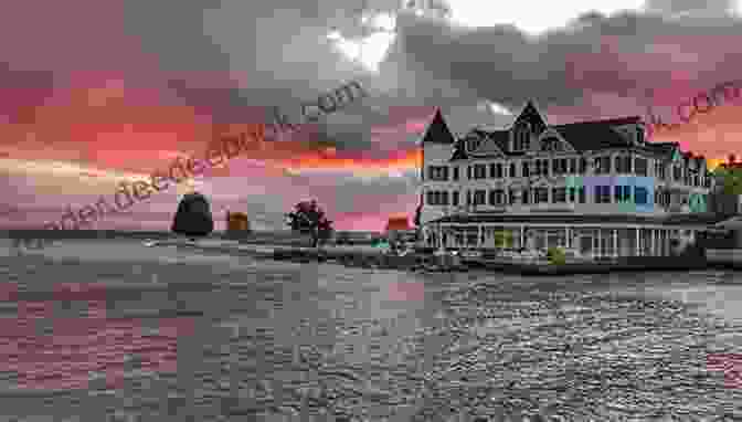 A Breathtaking Sunset Over Mackinac Island, With The Silhouette Of The Grand Hotel In The Foreground Mackinac Sunsets (Secrets Of Mackinac Island 2)