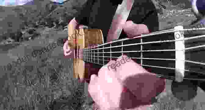 A Fingerstyle Guitarist Performing A Classic Rock Arrangement On A Classical Guitar Classic Rock For Classical Guitar