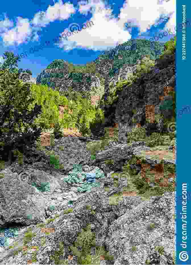 A Panoramic View Of The Samaria Gorge, With Its Towering Cliffs, Winding Paths, And Vibrant Vegetation. Images Of Crete Loose Ends