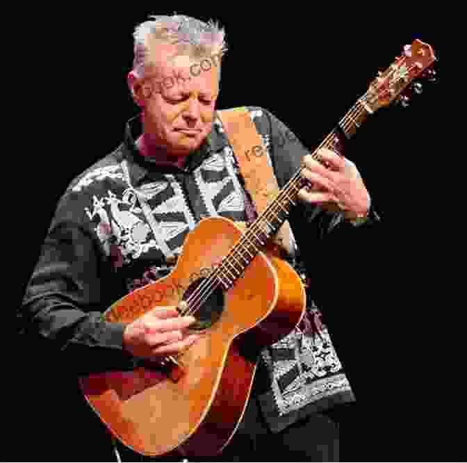 A Photograph Of Tommy Emmanuel Performing On A Classical Guitar Classic Rock For Classical Guitar